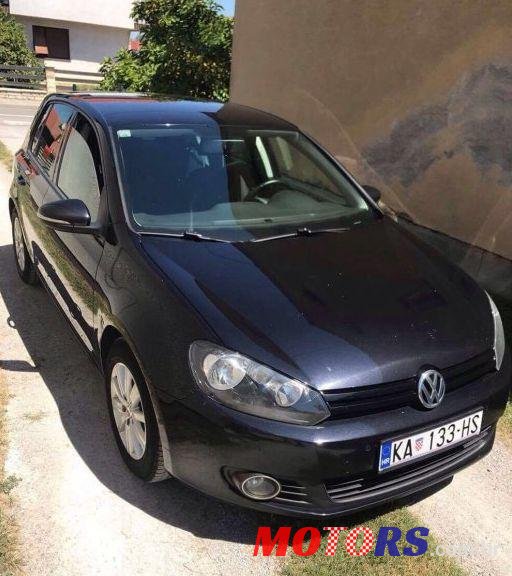 2012' Volkswagen Golf VI 1,6 Tdi photo #1