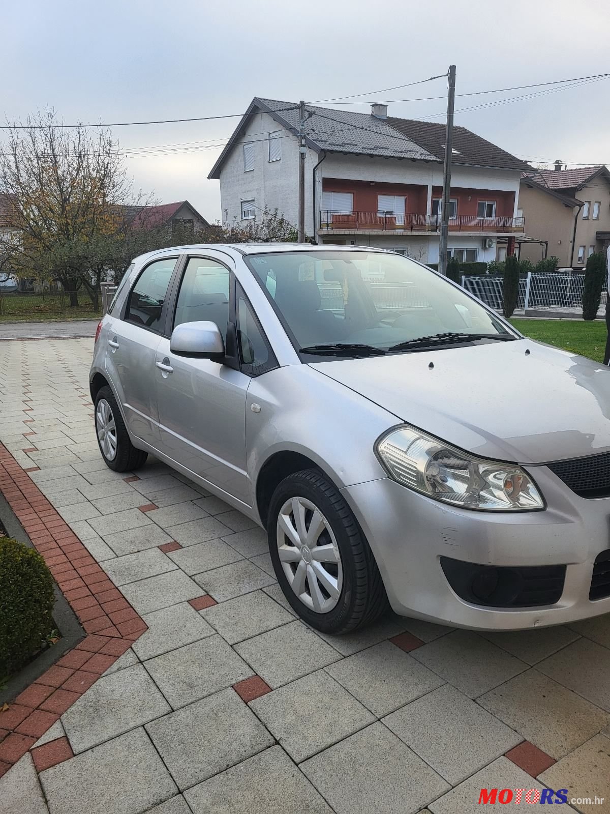 2005' Suzuki SX4 1.5 photo #1