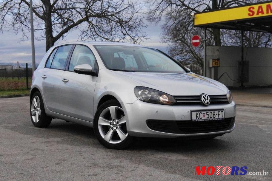 2011' Volkswagen Golf VI 1,6 Tdi photo #1