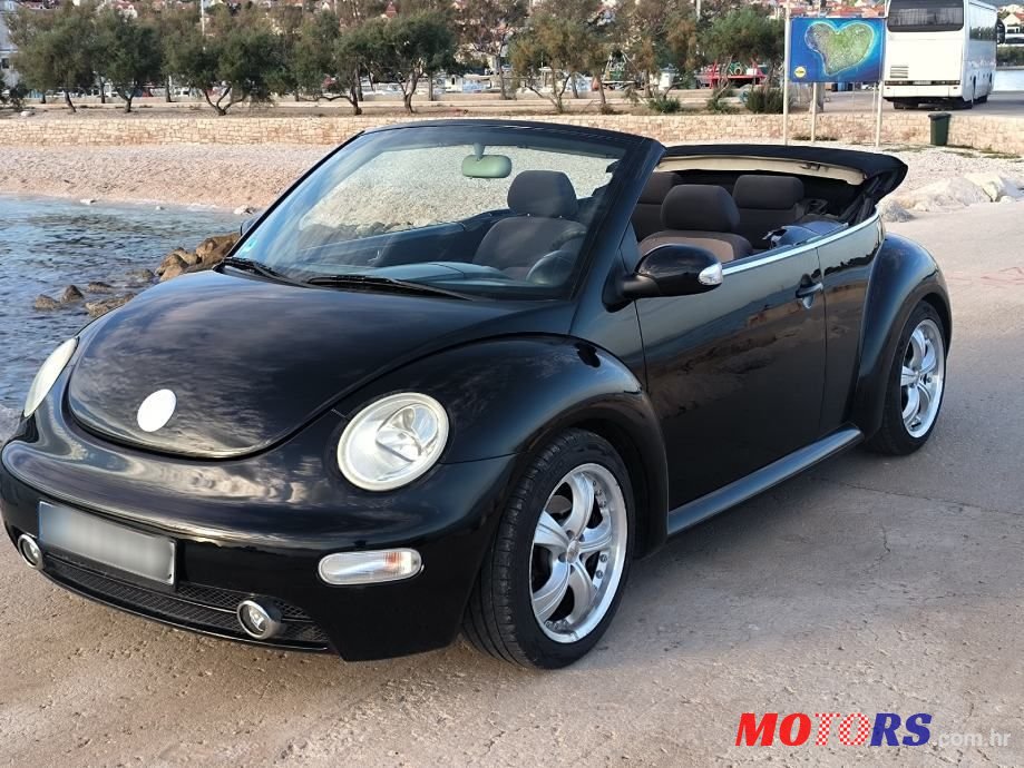 2004' Volkswagen Beetle 1,4 photo #3