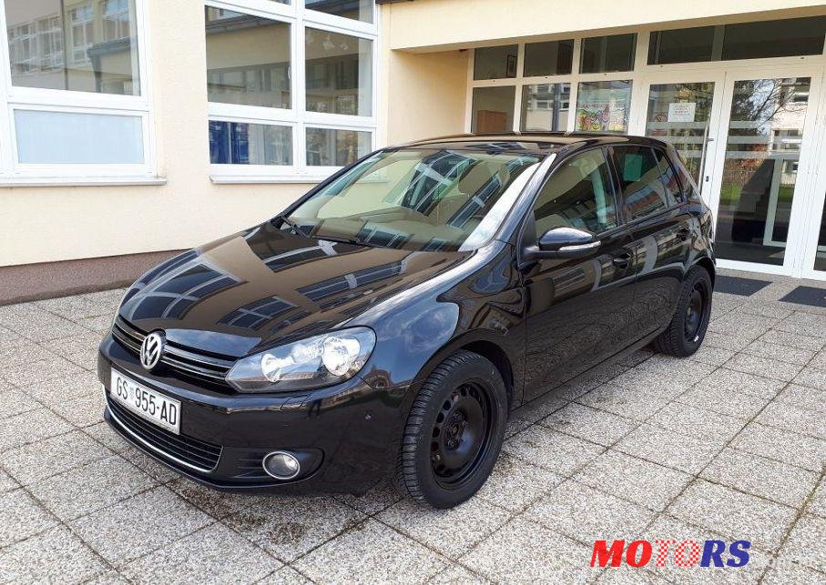 2011' Volkswagen Golf VI 1,6 Tdi photo #2