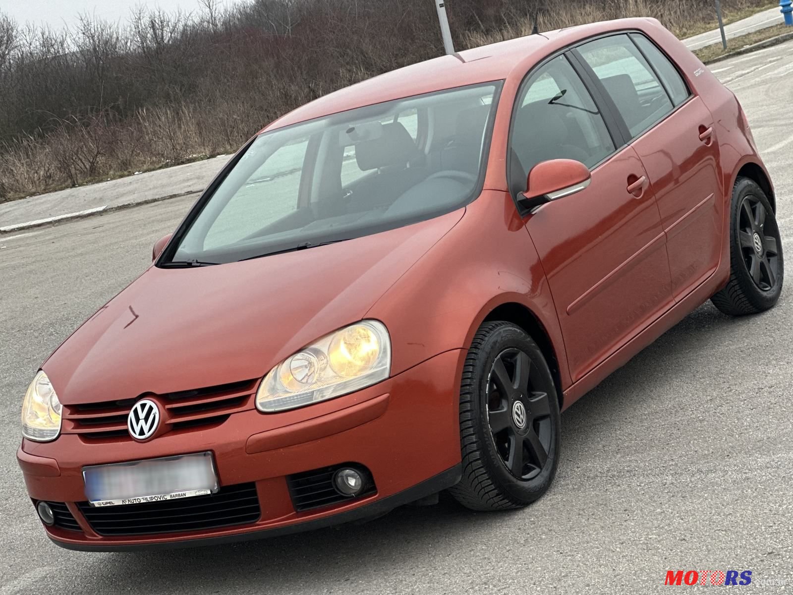 2006' Volkswagen Golf V 1,6 photo #1