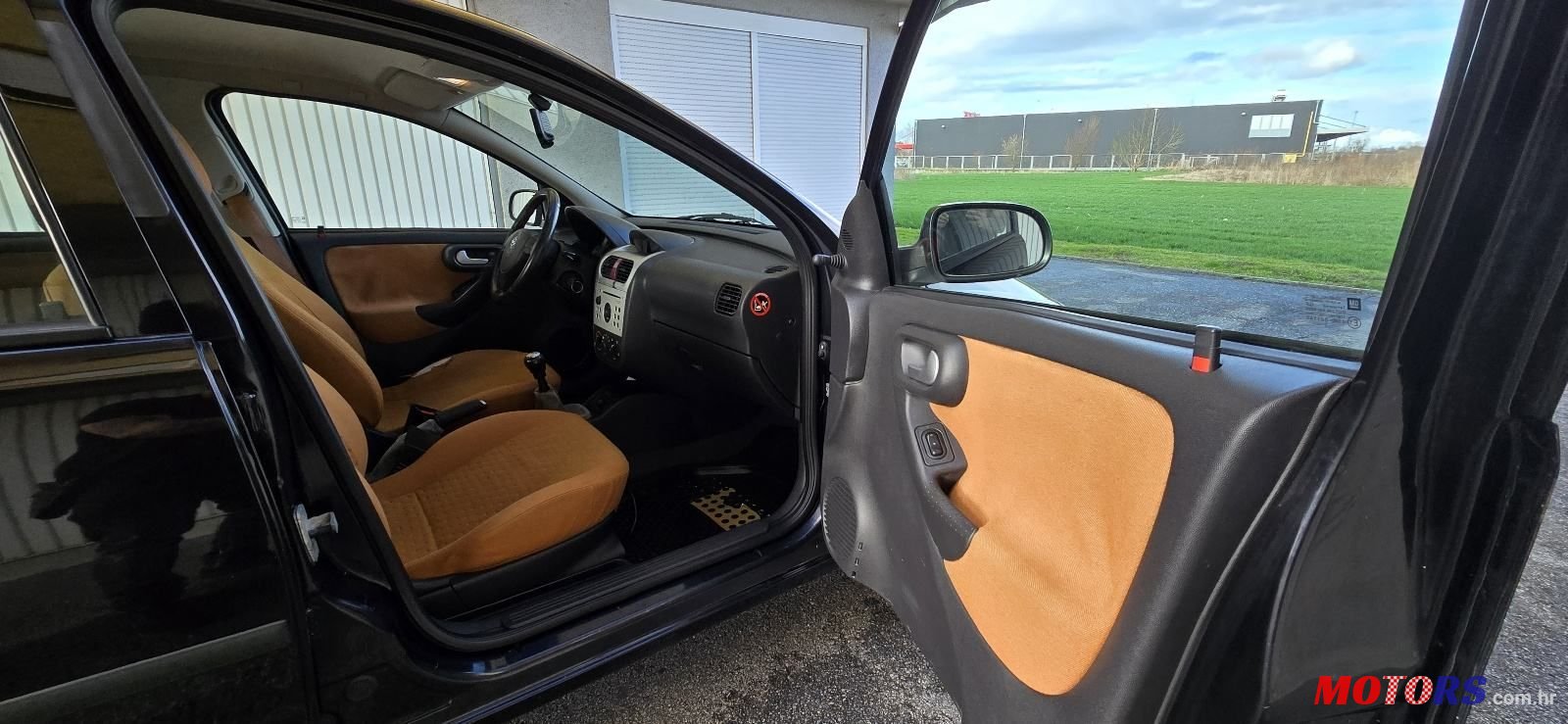 2004' Opel Corsa 1,2 16V photo #6