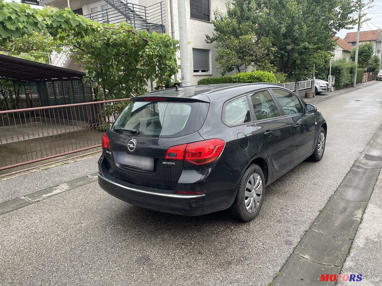 2014' Opel Astra Karavan photo #3