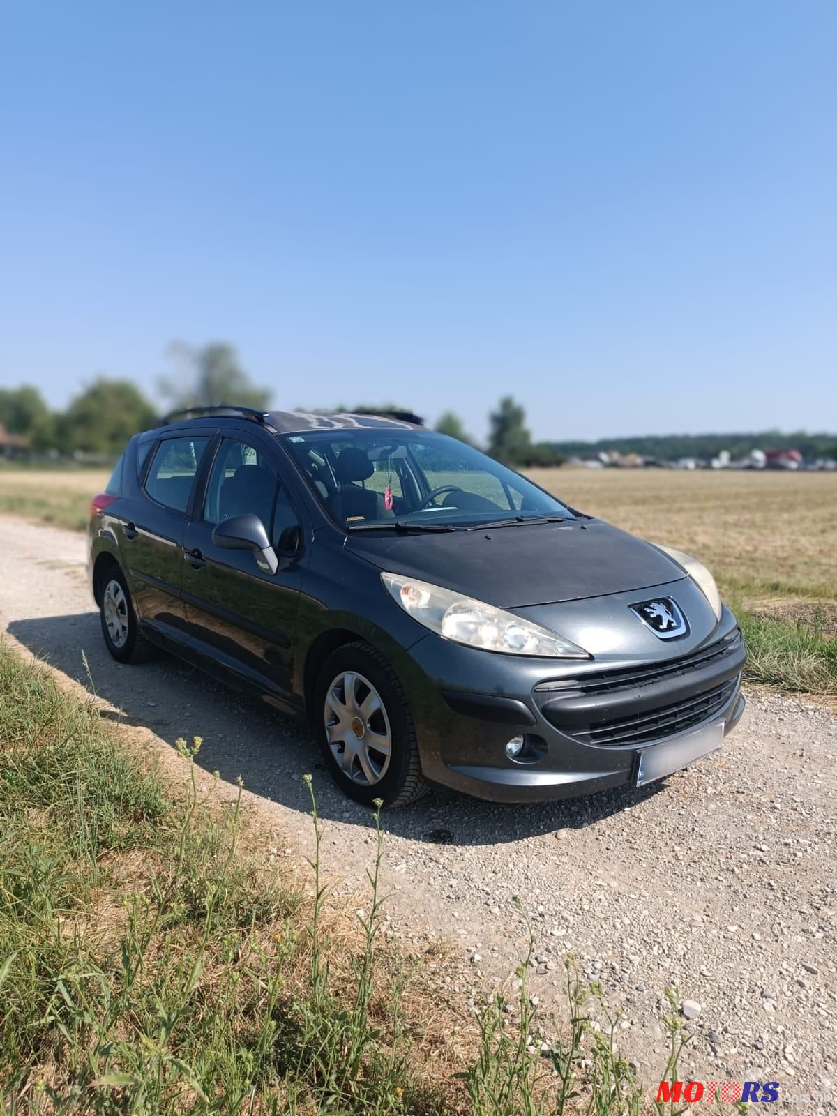 2008' Peugeot 207 Sw photo #2