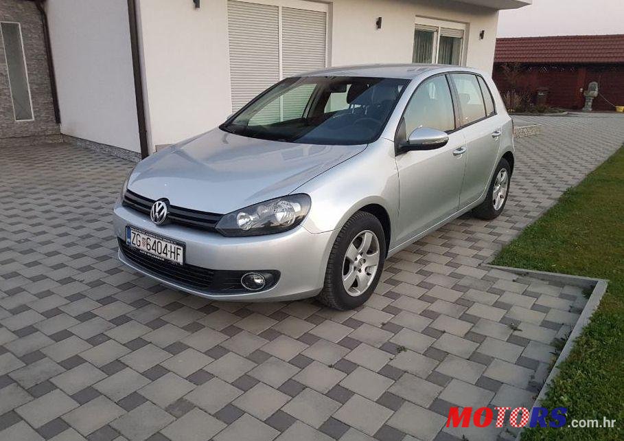 2011' Volkswagen Golf VI 1,6 Tdi photo #1