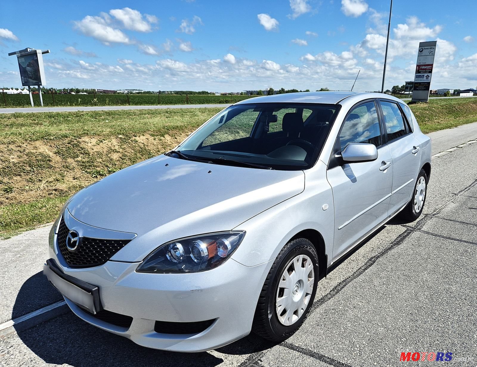 2005' Mazda 3 Sport 1,4 I Ce photo #2