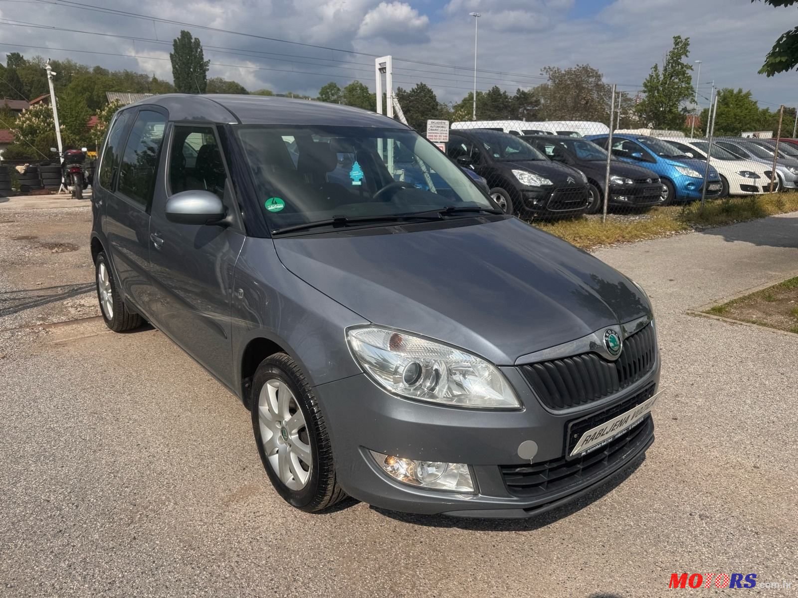 2013' Skoda Roomster 1,6 Tdi photo #2