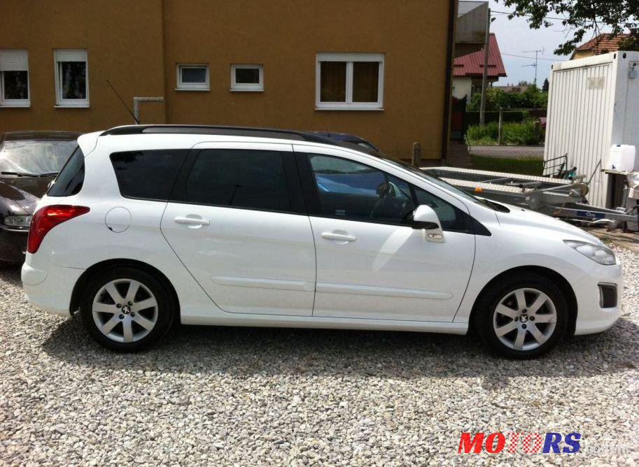 2012' Peugeot 308 Sw 1,6 E-Hdi photo #2