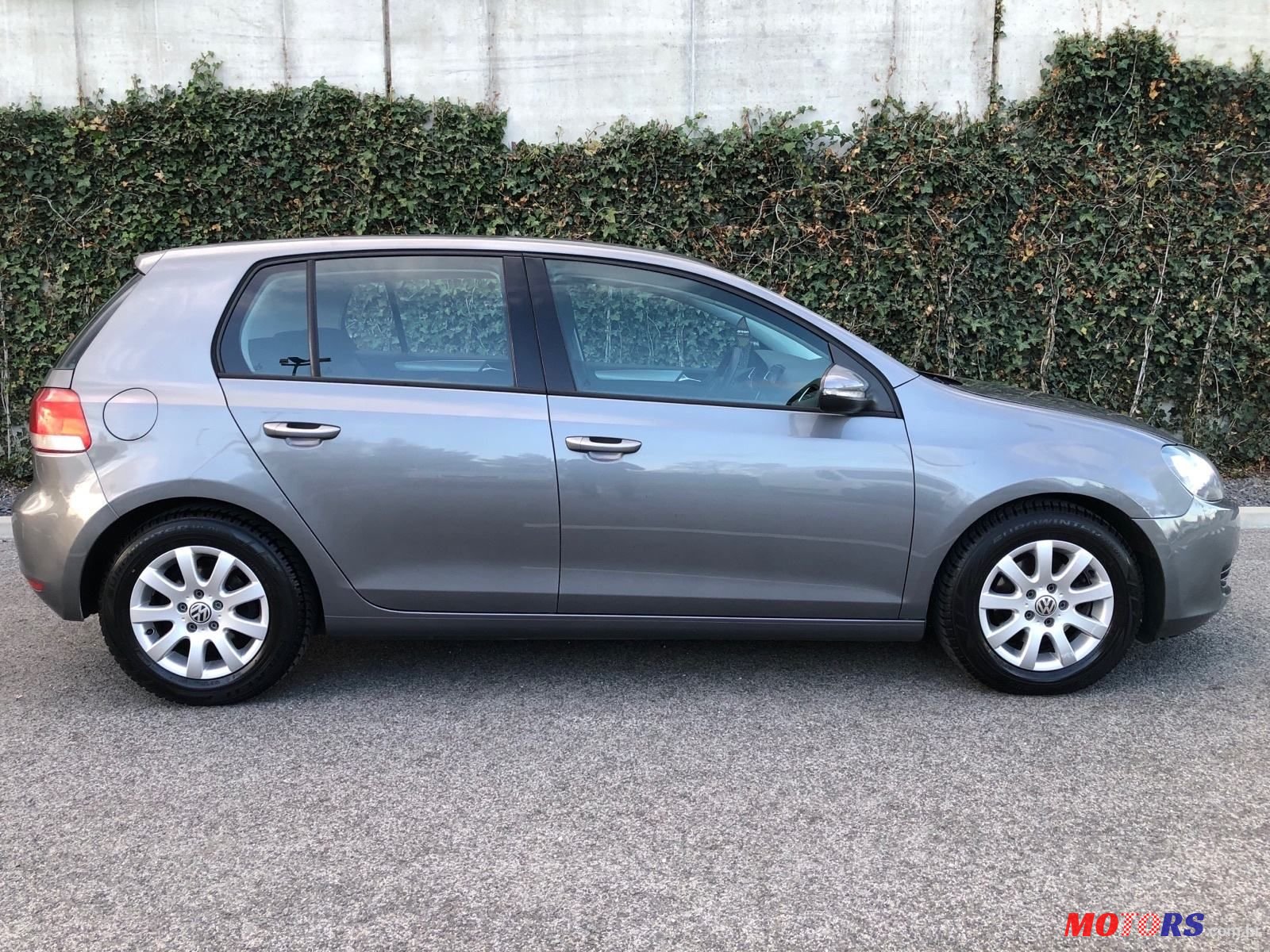 2011' Volkswagen Golf VI 1,6 Tdi photo #2