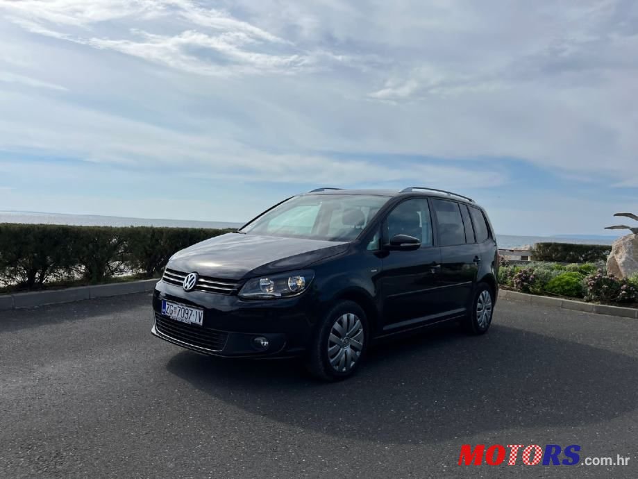 2014' Volkswagen Touran photo #3