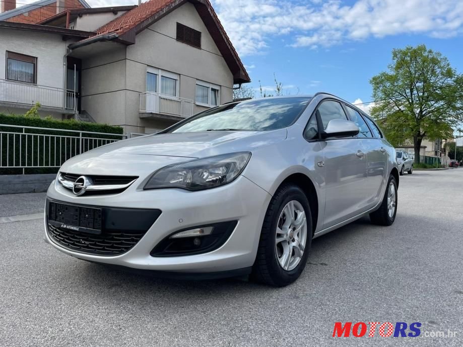 2014' Opel Astra Karavan photo #1