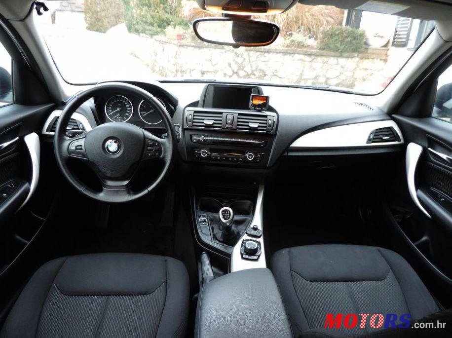 2012' BMW 1 Series 118D Sport photo #1