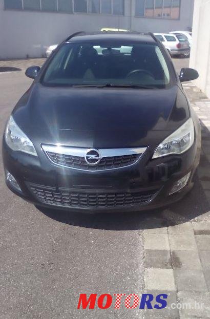 2012' Opel Astra Karavan photo #1