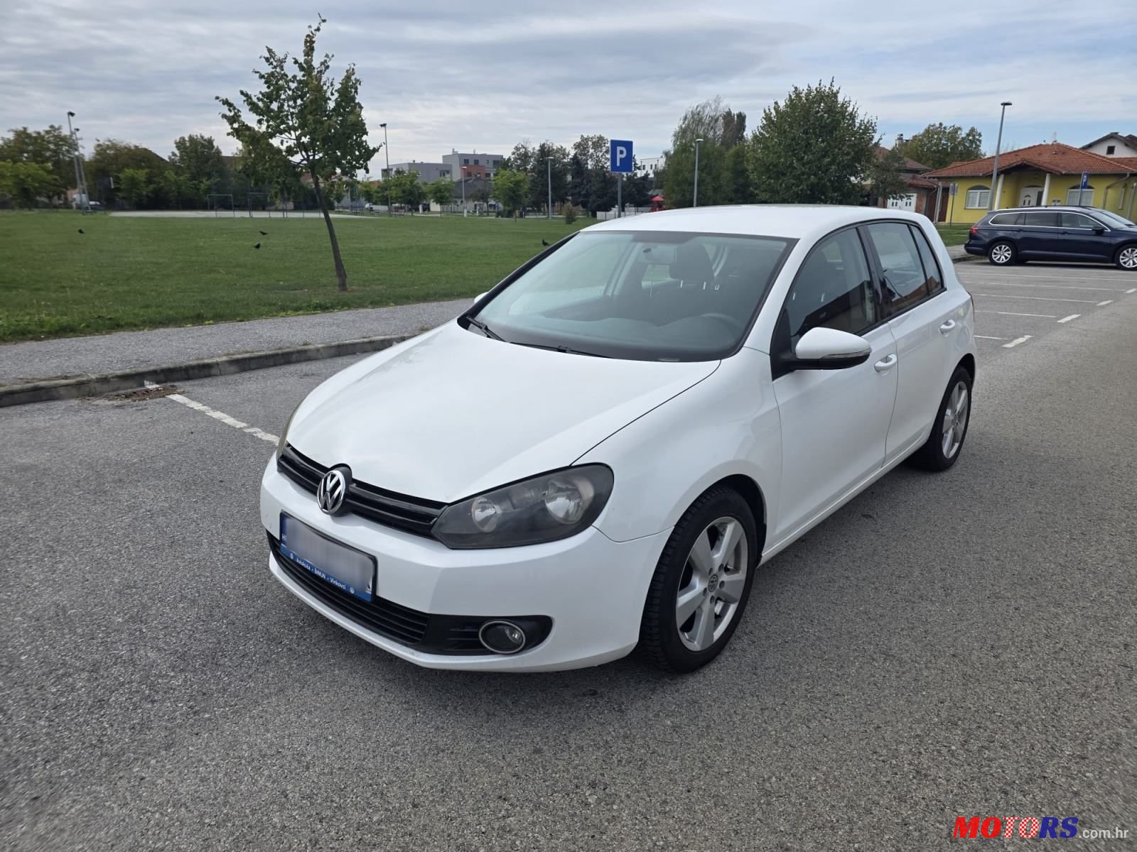 2011' Volkswagen Golf VI 1,6 Tdi photo #1