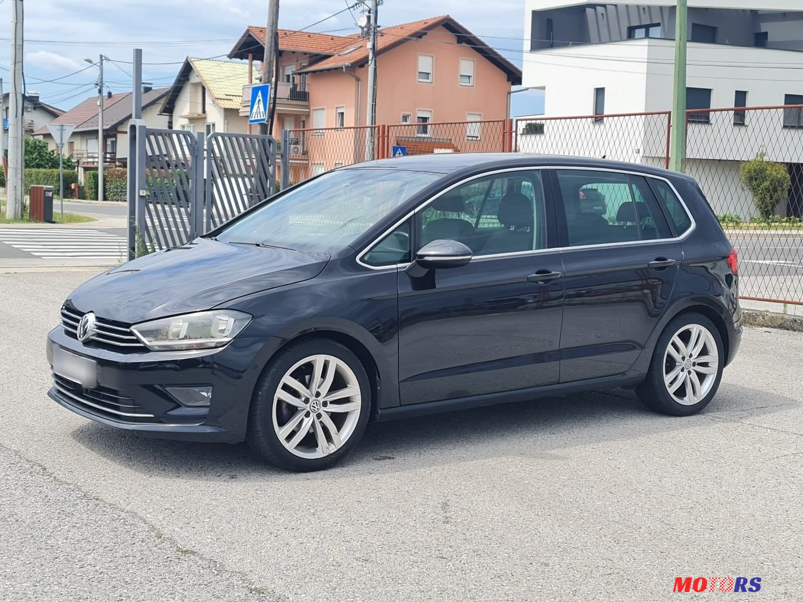 2015' Volkswagen Golf Sportsvan photo #1