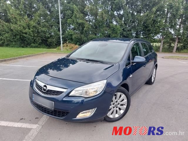 2012' Opel Astra Karavan photo #1