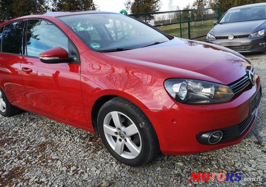 2011' Volkswagen Golf VI 1,6 Tdi photo #1