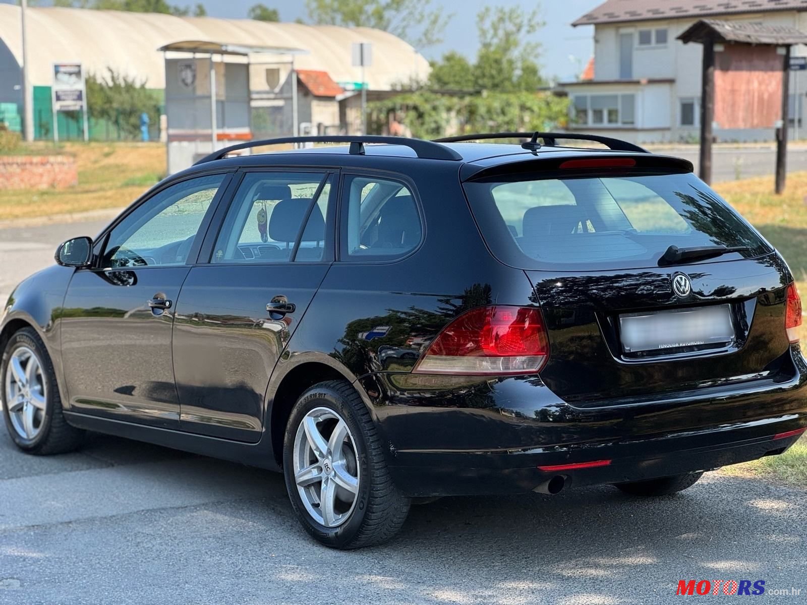 2011' Volkswagen Golf VI Variant photo #4