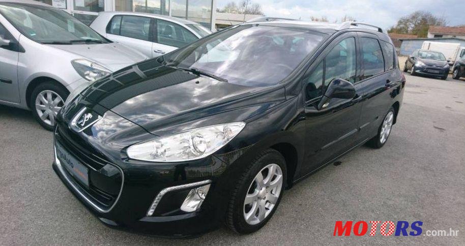 2011' Peugeot 308 Sw 1,6 Hdi photo #1