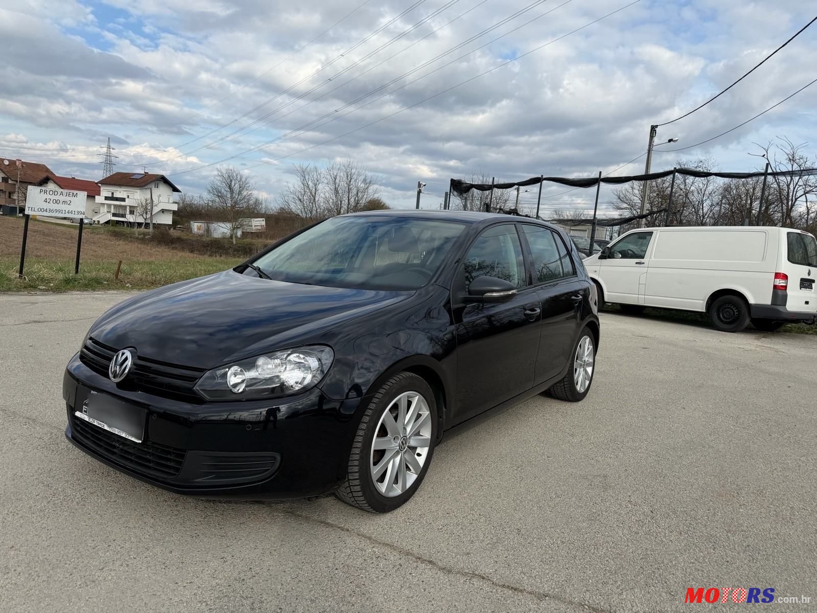 2009' Volkswagen Golf VI 1,6 Tdi photo #1