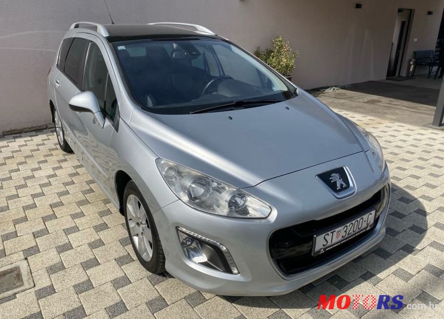 2012' Peugeot 308 Sw 1,6 Hdi photo #1