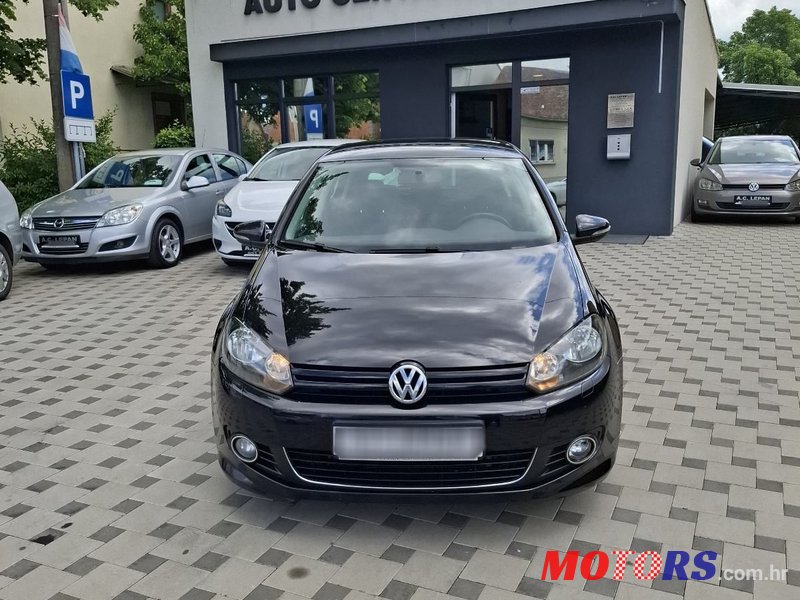 2011' Volkswagen Golf VI 1,6 Tdi photo #1