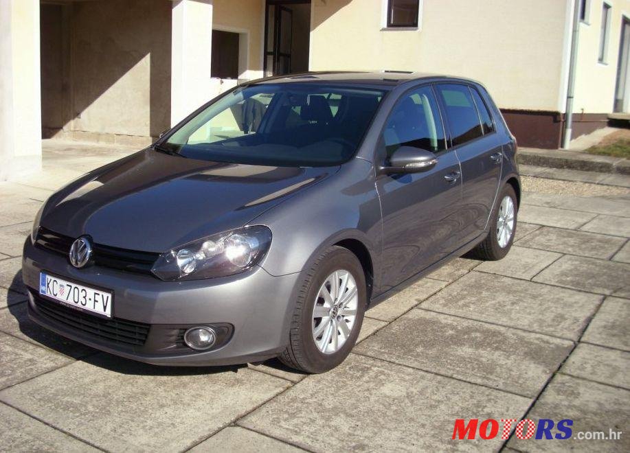 2012' Volkswagen Golf VI 1,6 Tdi photo #1