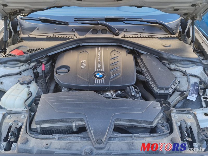2012' BMW 118 D photo #1