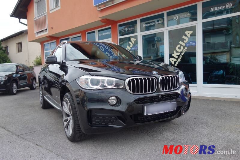 2015' BMW X6 40D photo #1