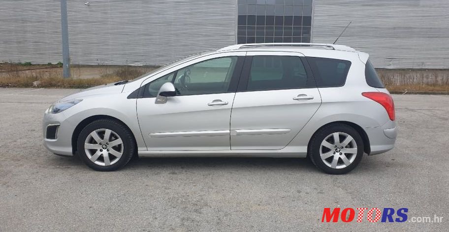 2013' Peugeot 308 Sw 1,6 E-Hdi photo #1