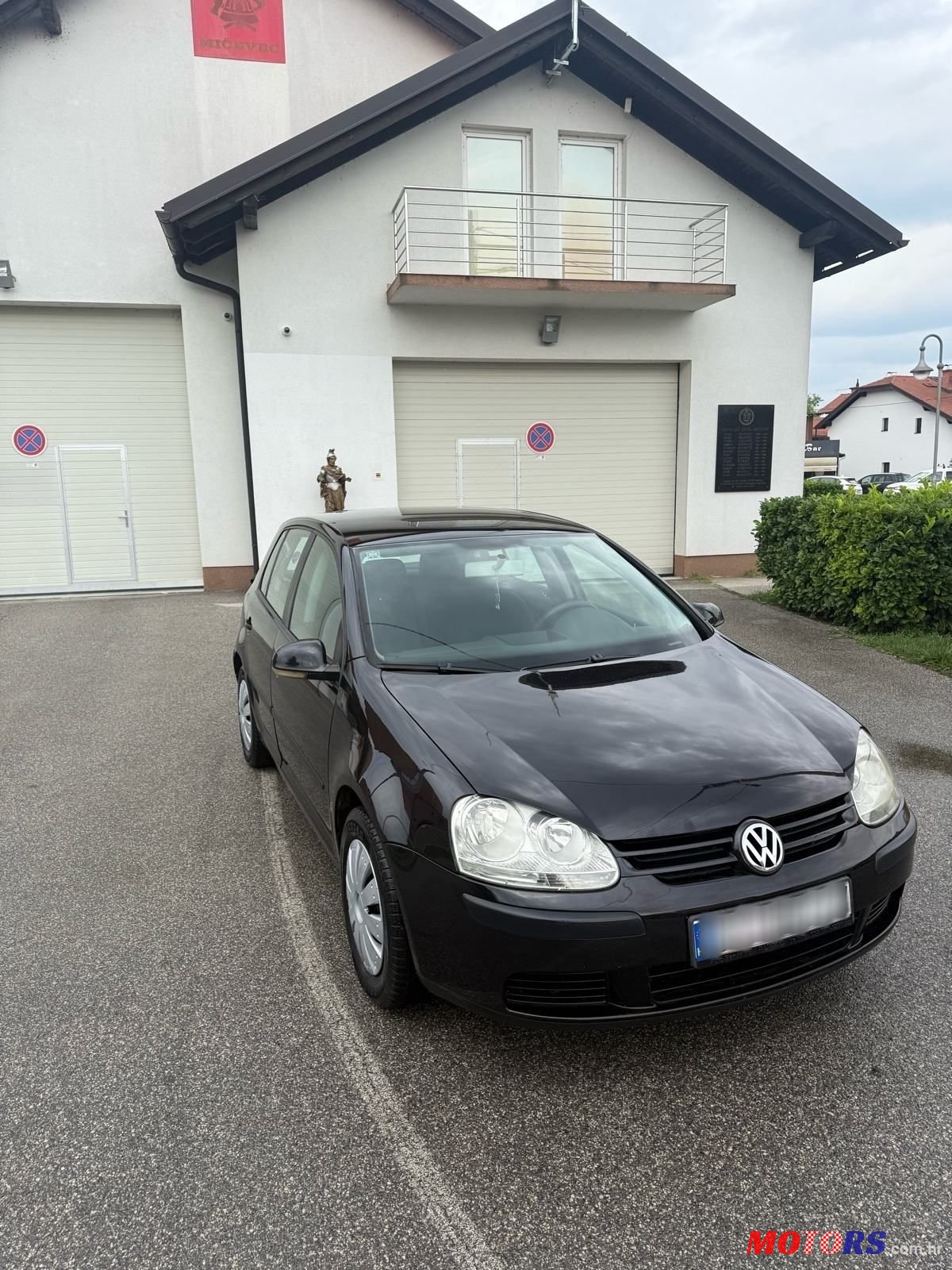 2004' Volkswagen Golf V 1,4 photo #1