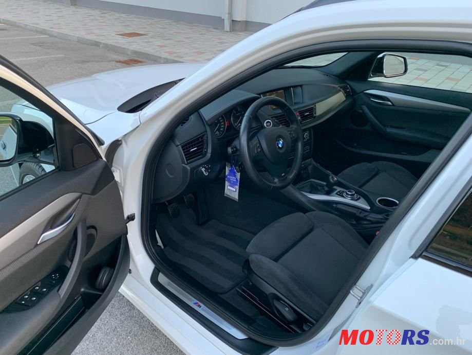 2014' BMW X1 Sdrive18D photo #6