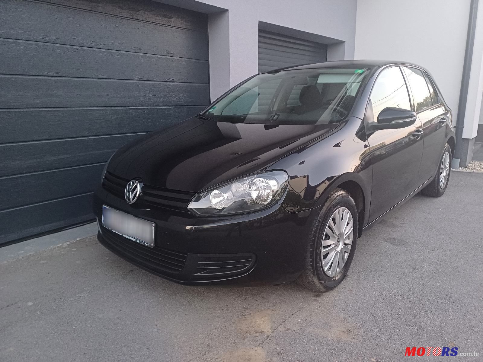 2009' Volkswagen Golf VI 1,6 Tdi photo #3
