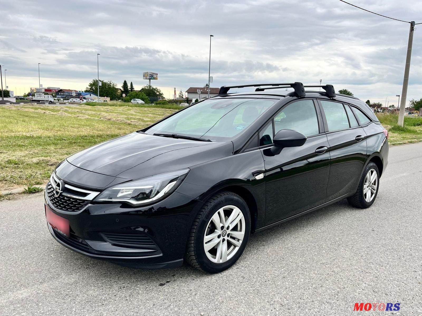 2017' Opel Astra Karavan photo #1
