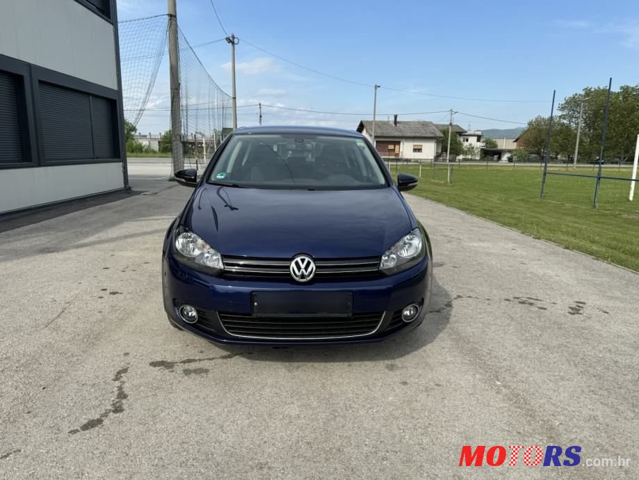 2011' Volkswagen Golf VI 1,6 Tdi photo #2