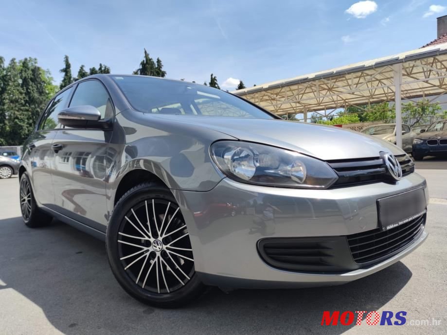 2011' Volkswagen Golf VI 1,6 Tdi photo #3