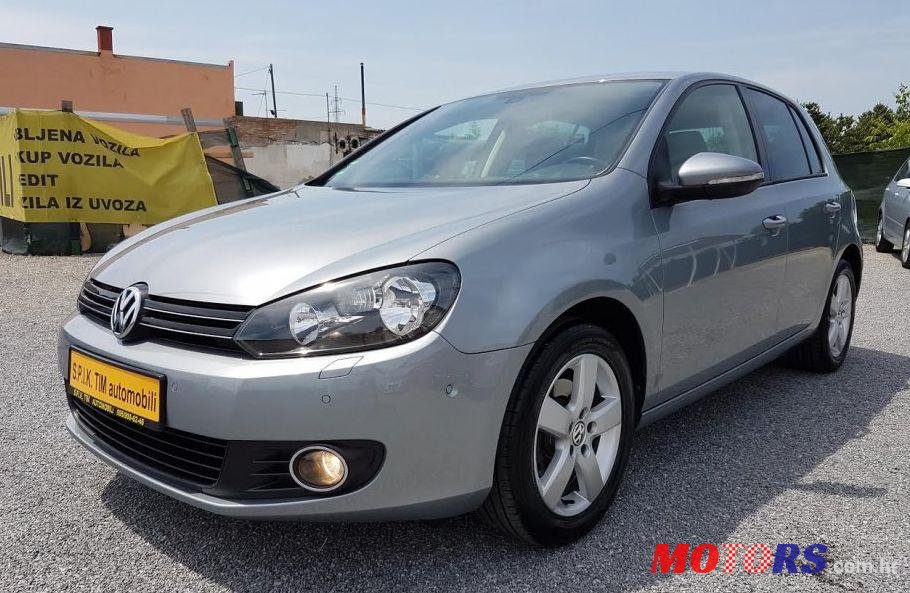 2010' Volkswagen Golf VI 1,6 Tdi photo #1
