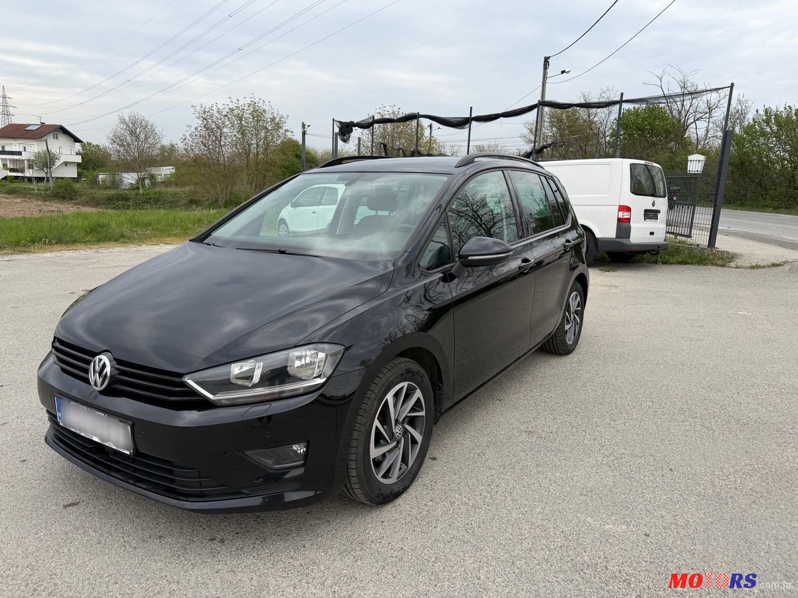 2014' Volkswagen Golf Sportsvan photo #1