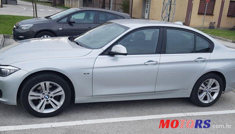 2014' BMW Serija 3 318D photo #1