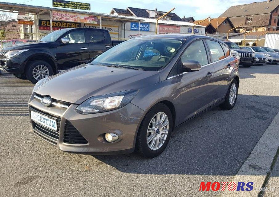 2011' Ford Focus 1,6 photo #1