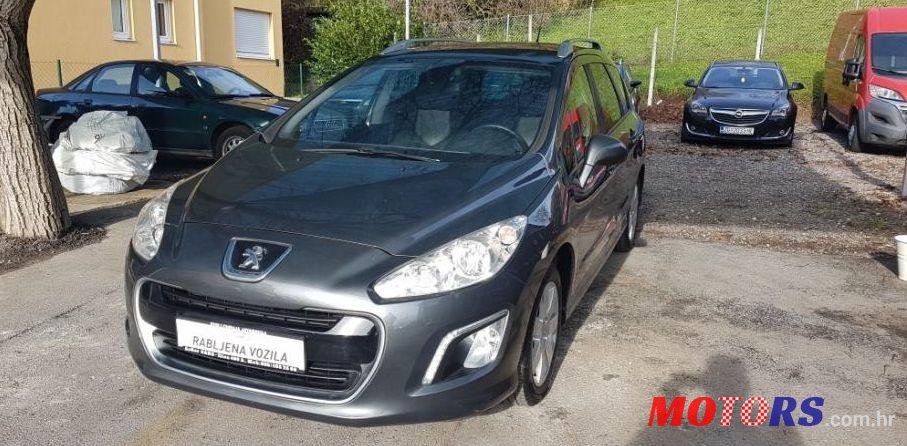 2012' Peugeot 308 Sw photo #3