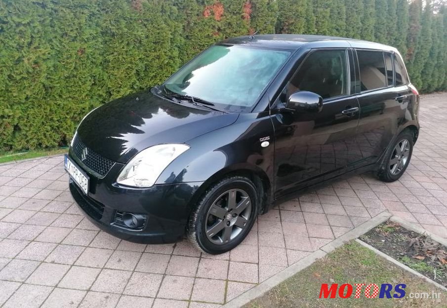 2009' Suzuki Swift 1,3 Glx photo #1