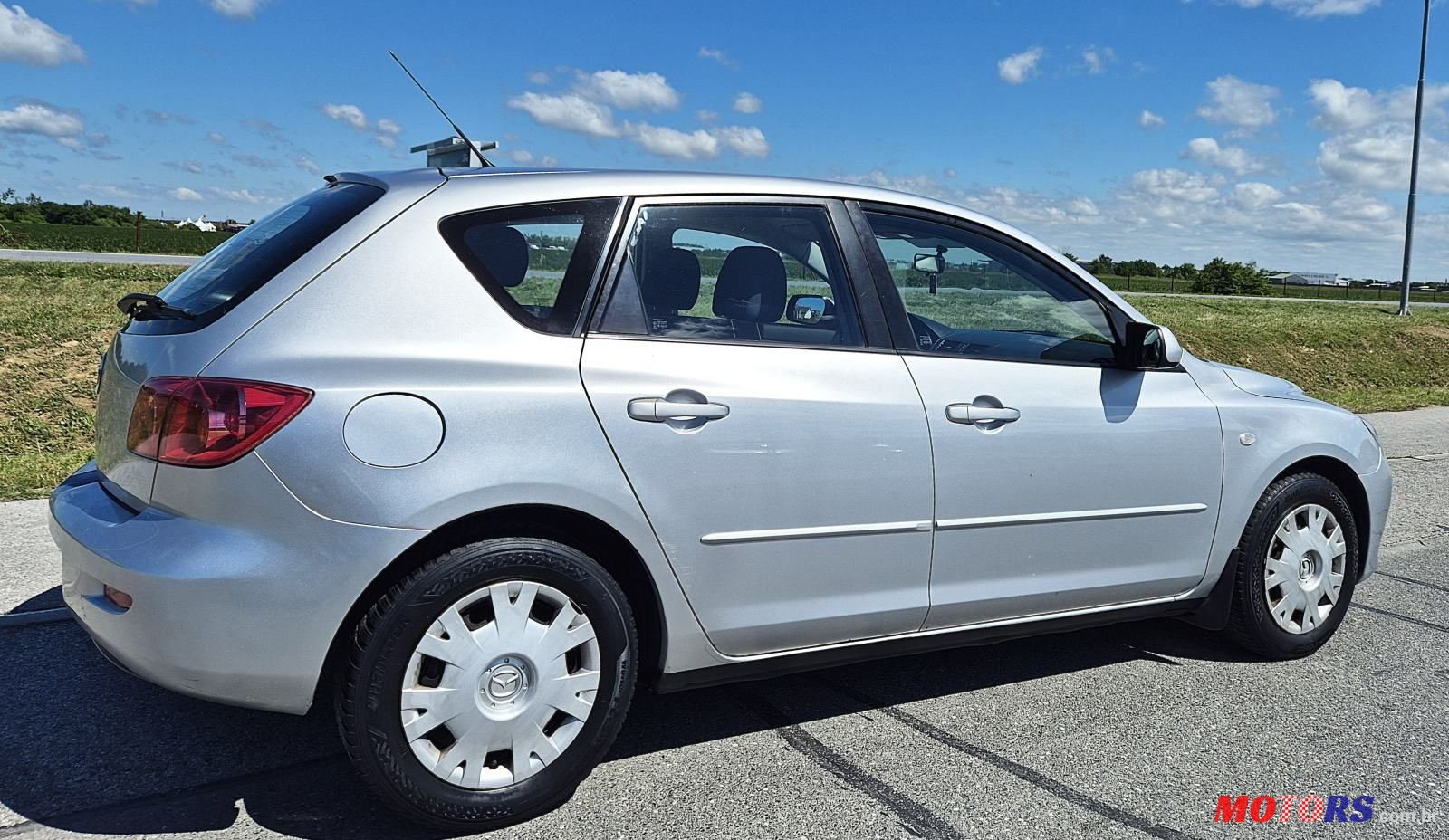 2005' Mazda 3 Sport 1,4 I Ce photo #4