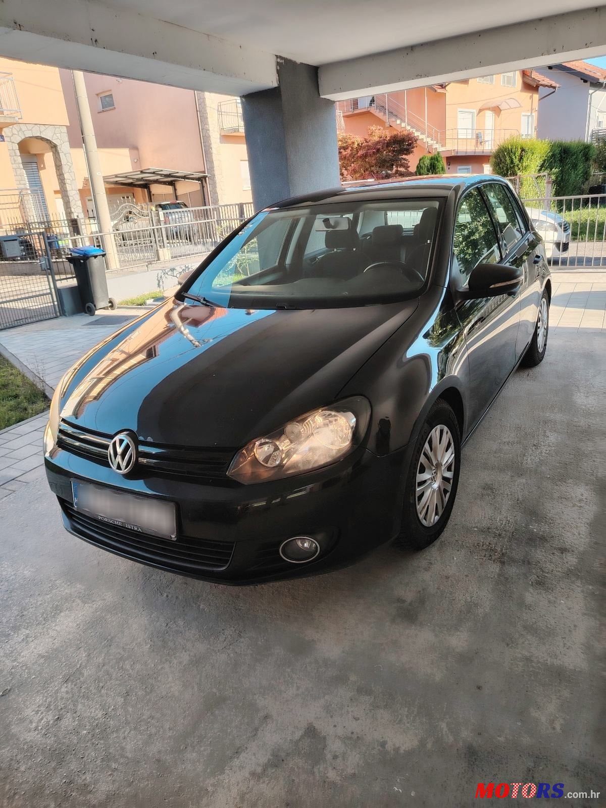 2012' Volkswagen Golf VI 1,6 Tdi photo #1