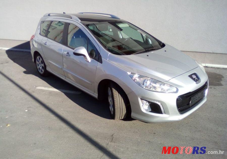 2013' Peugeot 308 Sw 1,6 Hdi photo #1