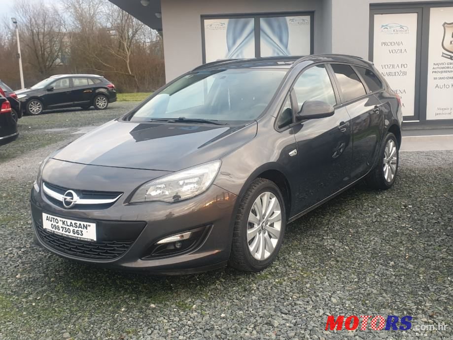 2014' Opel Astra Karavan photo #1