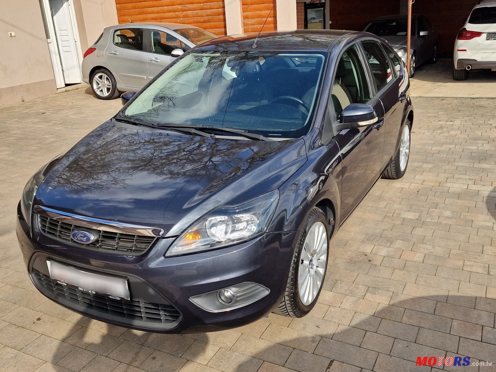 2009' Ford Focus 1,6 photo #1