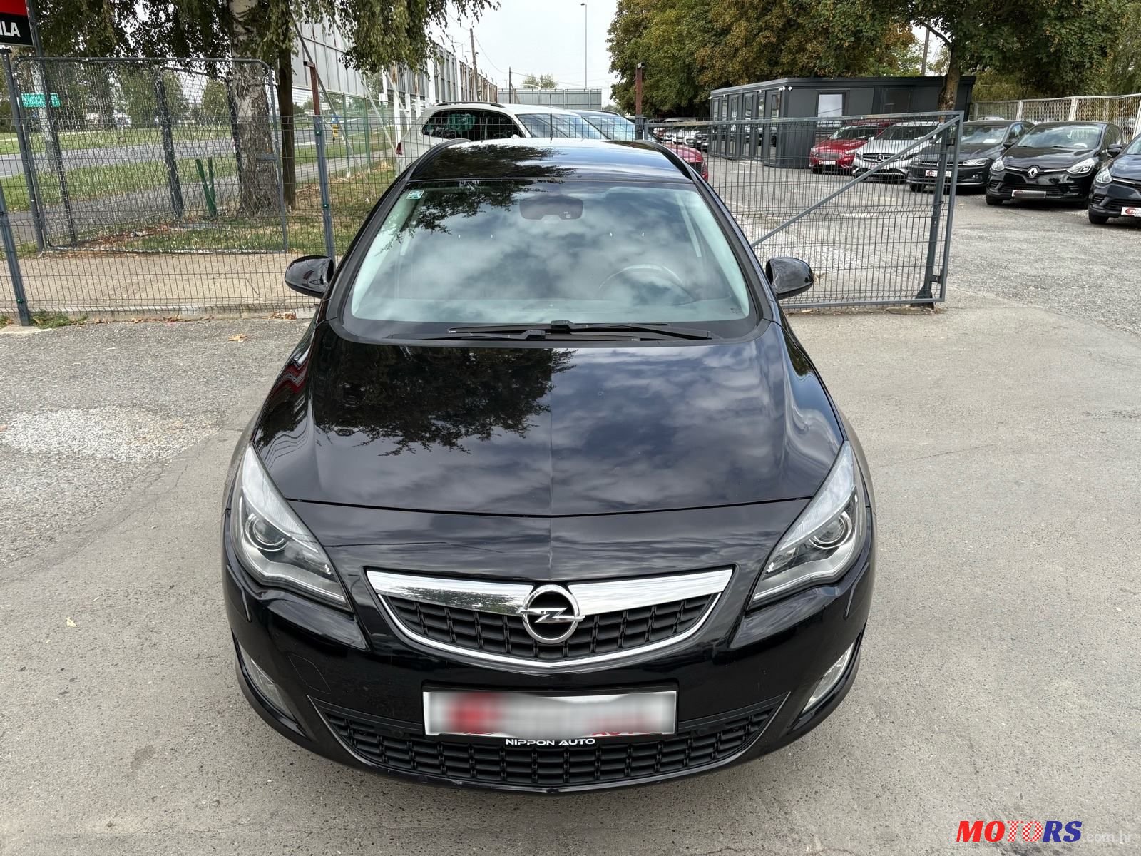 2011' Opel Astra Karavan photo #2