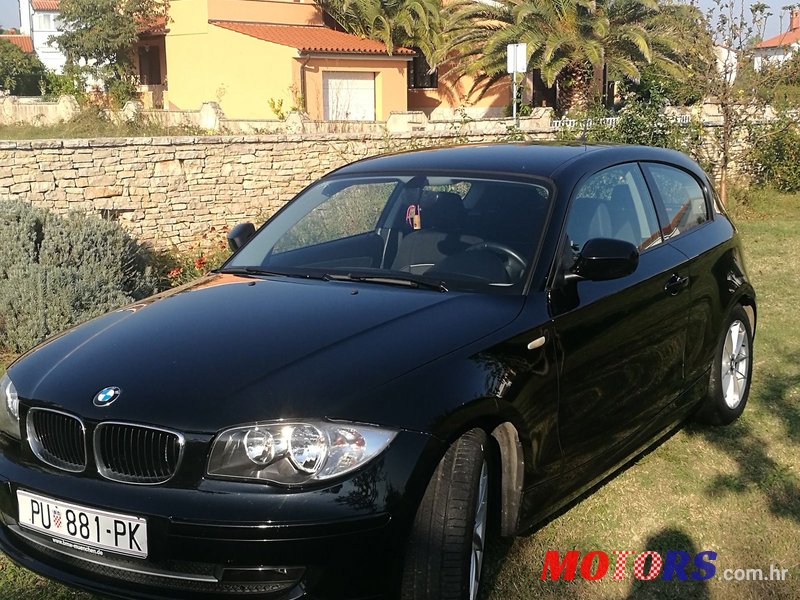 2011' BMW 1 Series 3 Door 116d photo #1
